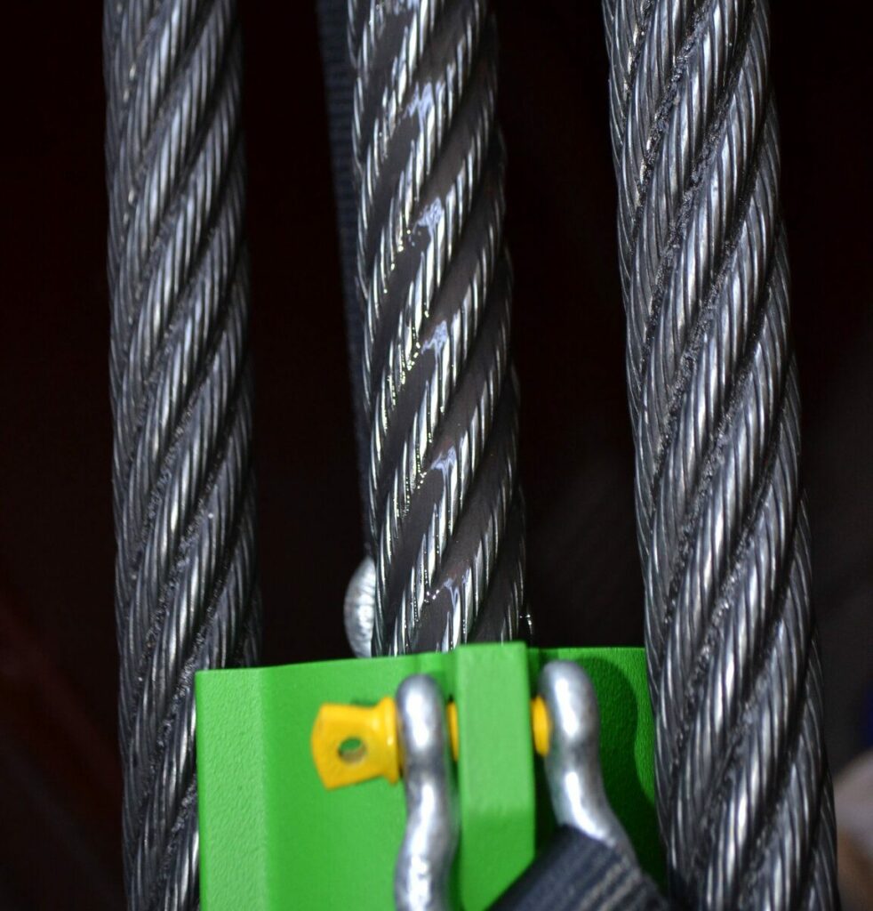 A close-up of 3 wire ropes